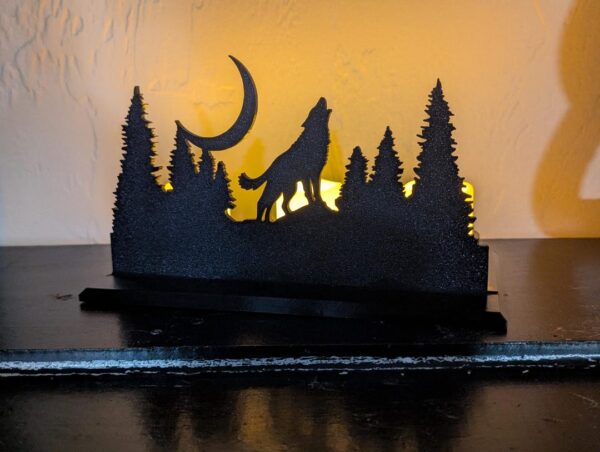 Howling Wolf Silhouette with Flickering Artificial Candles